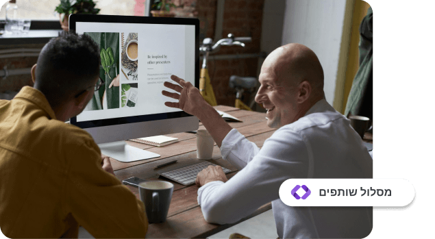 Two men sitting at a table, looking at a computer screen displaying a presentation, with one man smiling and gesturing. A button labeled 'Affiliate Program' is displayed in the bottom right corner.